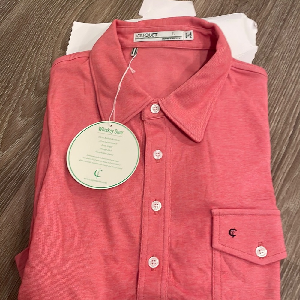 NWT men’s short sleeve Criquet polo. Salmon coral color